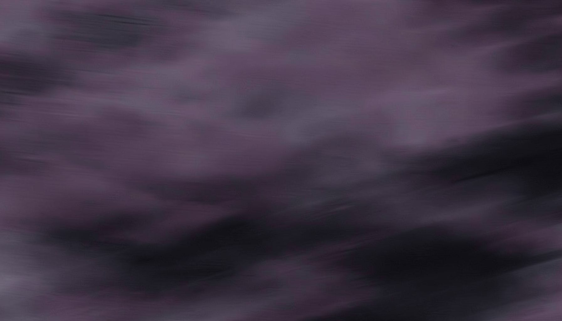 Muted plum and charcoal abstract texture with subtle motion blur, understated animated aesthetic