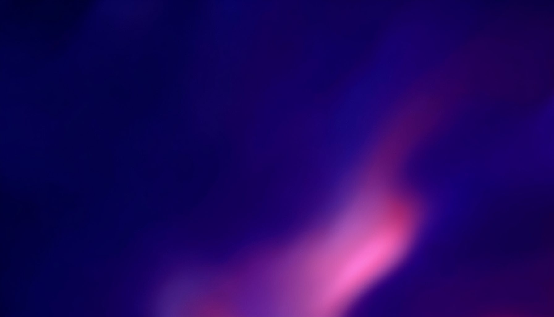 Deep indigo and rose abstract gradient with soft glowing edges, atmospheric animated feel